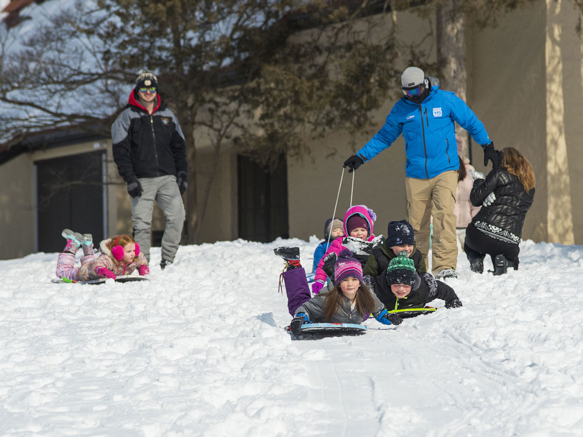 Sledding at Potawatomi Inn